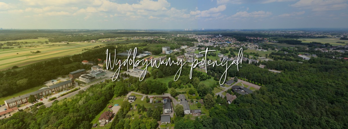 Miasto lędziny z drona z napisem wydobywamy potencjał na środku